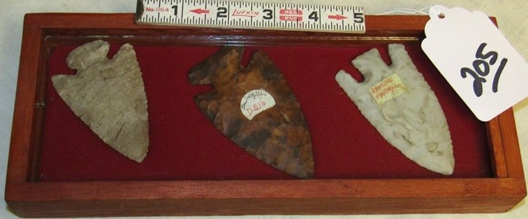 3 points: Wood display with 3 pc points, largest 3 1/4", not examined for coa's