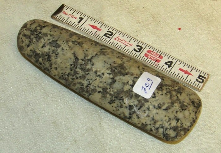 Celt: 5 1/2" speckled celt, not examined for coa