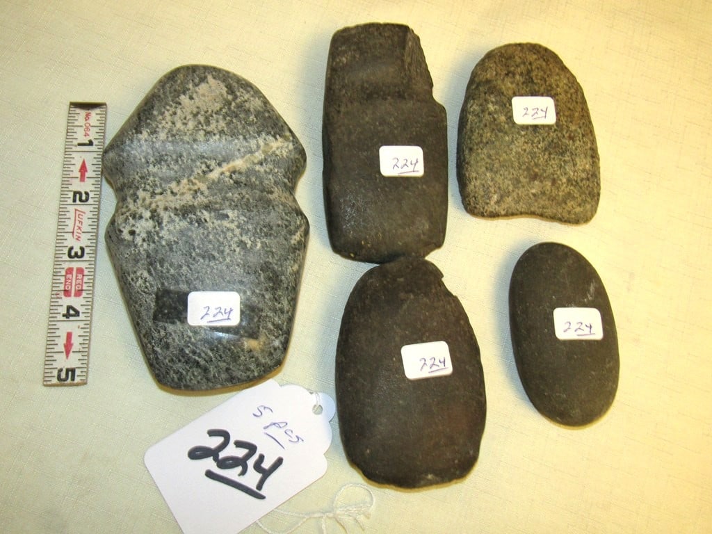 Axe: 5 1/2" stone axe, full groove, not examined for coa