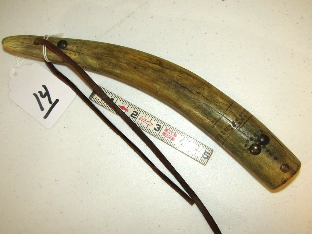 Quirt: 11 1/4" bone quirt, tack decorated, etched markings, good condiiton, Jewell Beranek collection,