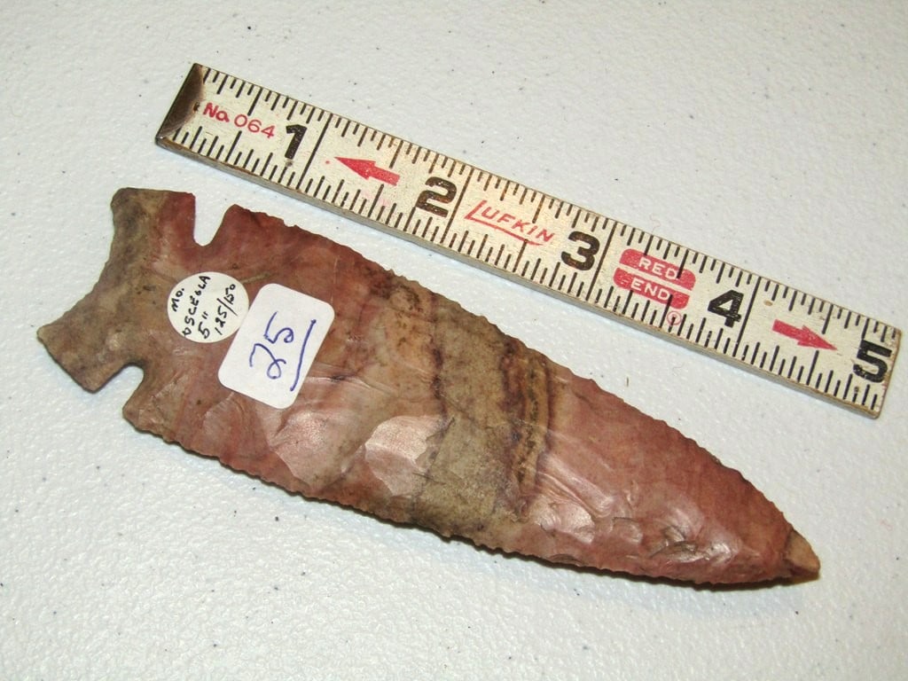 Point: Large 5" reddish colored Osceola point, Cook collection, not examined for coa