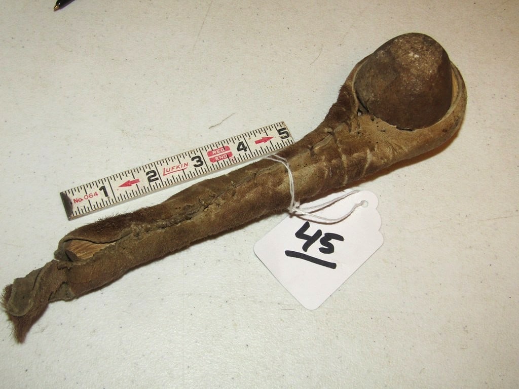 Club: 9" club with 2 1/2" stone head, hide wrapped sinew sewn handle, Baranek collection, good condition