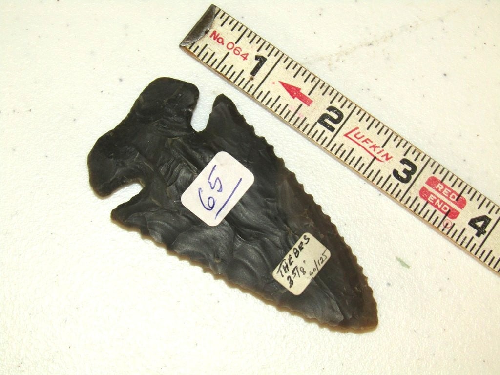 Point: 3 5/8" black Thebes point, serrated, Cook collection, not examined for coa