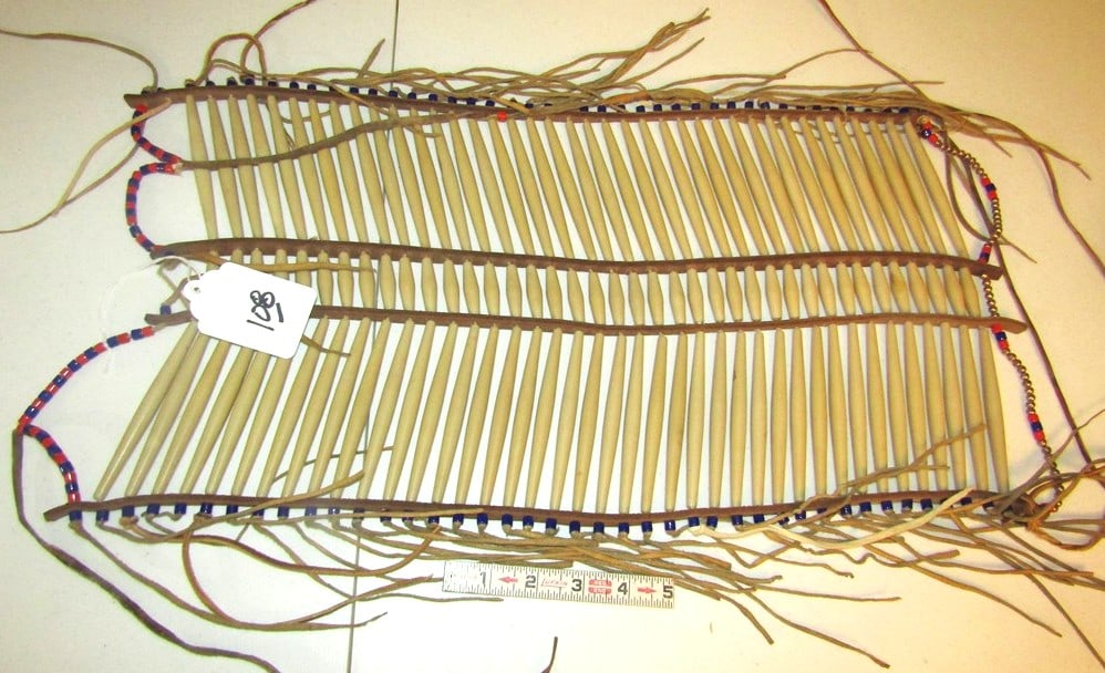 Breast plate: Plains large hair pipe breast plate, turkey feathers, trade beads, 23" x 12", good condition