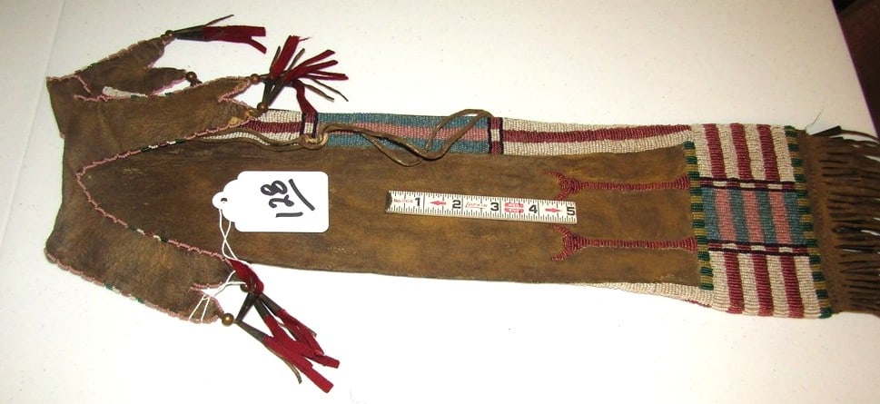 Pipe bag: Southern Cheyenne large bead pipe bag,20 x 6" +long fringe, sinew sewn,cones,horsehair, animal pictorial,brown ochre,good condition