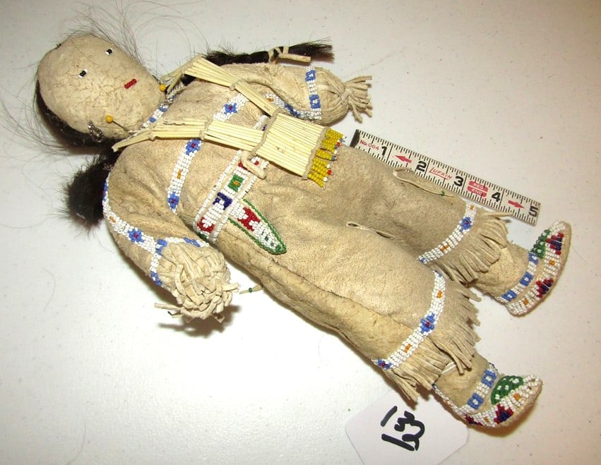 Doll: Plains 12 " hide doll, beadwork, sinew sewn, breast plate, human hair, with stand,good condition, Beranek collection