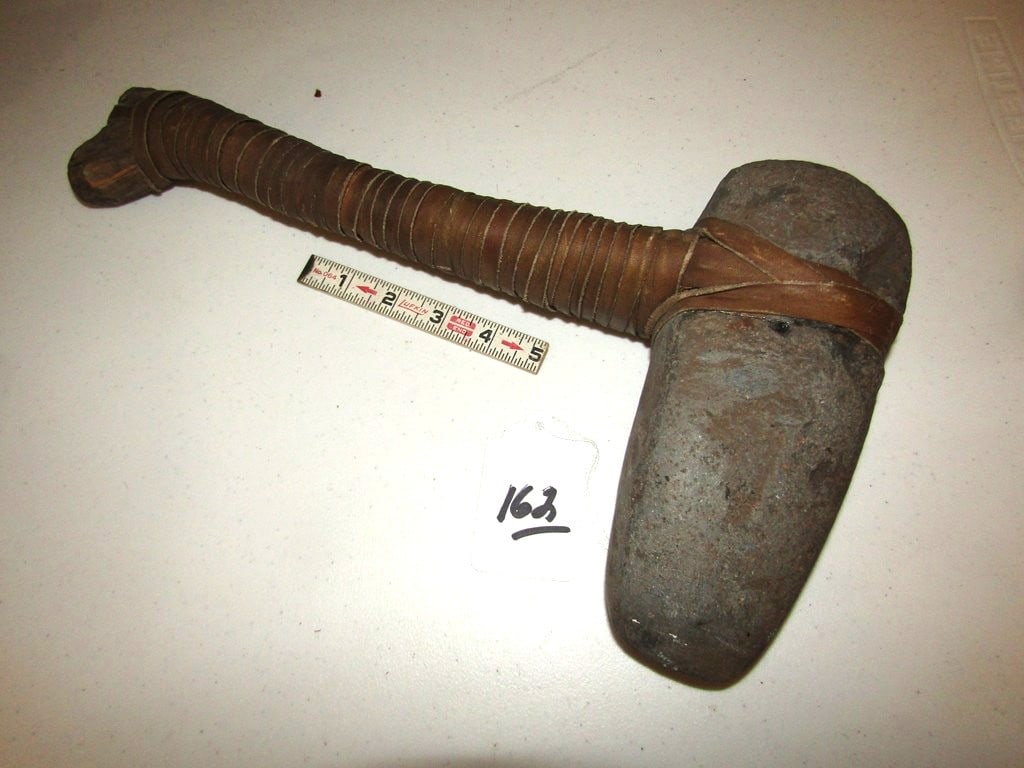Axe: Large 8" axe, 3/4 groove with later halfting, Not examined for coa, Beranek collection
