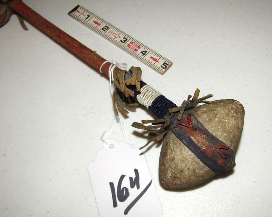 Club: Plains 27" stone head club with minor bead loss, sinew sewn, red ochre, good condition, Beranek collection