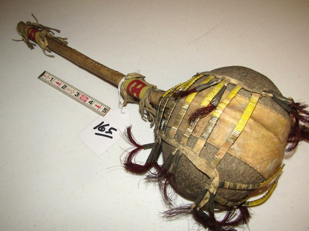 Club: Plains large quilled 6" stone head, some quill loss and separations, cones, horsehair, sinew sewn handle, Fair/Good condition, Beranek collection