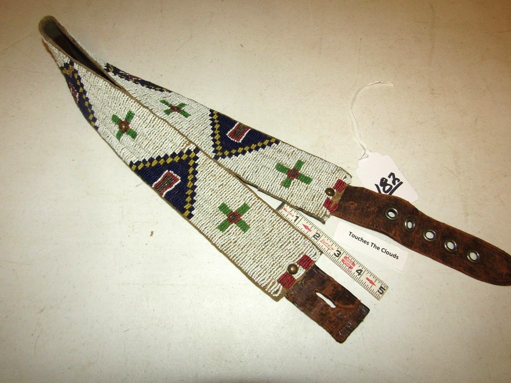 Bead belt: Sioux 37" beaded belt, sinew sewn, owner states belonging to "Touches the Clouds", Good condition, Beranek collection