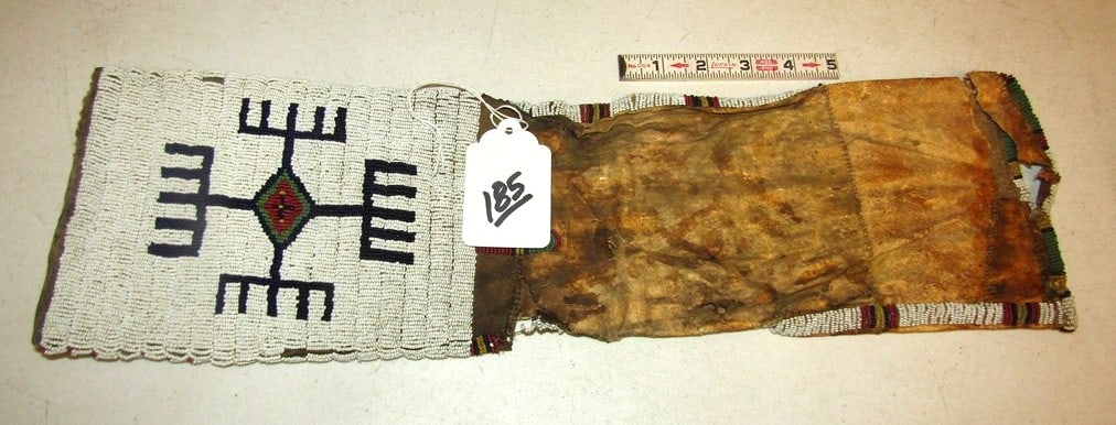 Pipe bag: Sioux 20 x 6" beaded pipe bag, damged, torn areas, sinew sewn, fragile,poor condition, Beranek collection