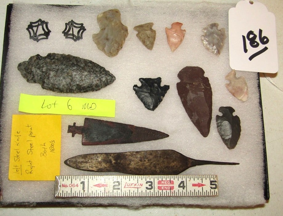13 pc: Display with 13 pc misc items including 6" rat tail point, lot 6, Idaho collection, not examined fot coa