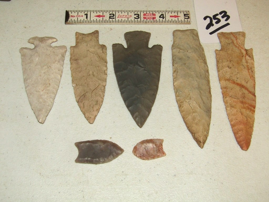 7 points: Display with 7 various points, largest is 4 7/8", Idaho collection that owner believes to be all reproductions, not examined for coa