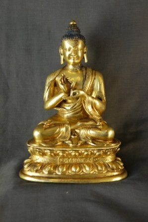 Fine Gilt Bronze Buddha Figure. Seated on double 