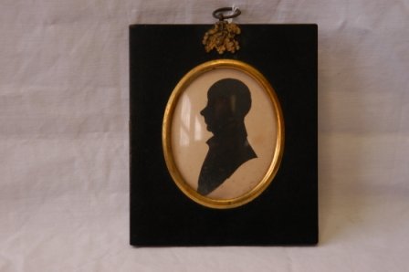 Early Victorian Silhouette in Original Frame. Ve: Early Victorian Silhouette in Original Frame. Verso inscription 'John White Parsons, born at Lambeth, 1811 - Died at Bothwell in Tasmania 15th June, 1850.' 13x11cm