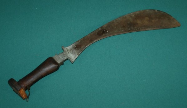 Machete. Wooden handle (A/F) with curved blade. L: Machete. Wooden handle (A/F) with curved blade. L 55cm