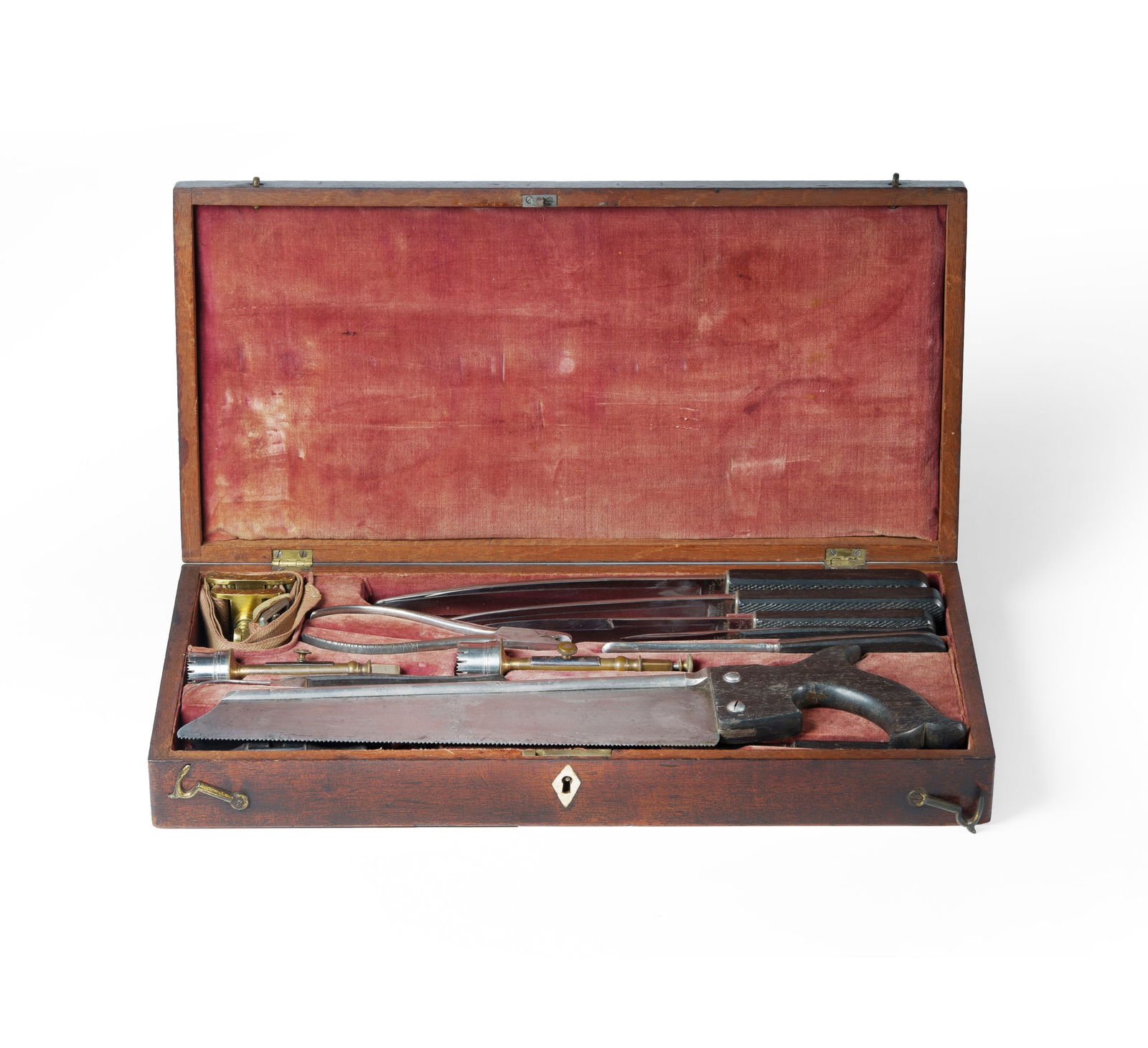 Early 19th C Cased Surgical Instrument Set: Early 19th C Cased Surgical Instrument Set In a fitted velvet-lined mahogany case. Including bone saw, scalpels, trephine etc. With ebony handles. 42x20.5x6.5cm (case)