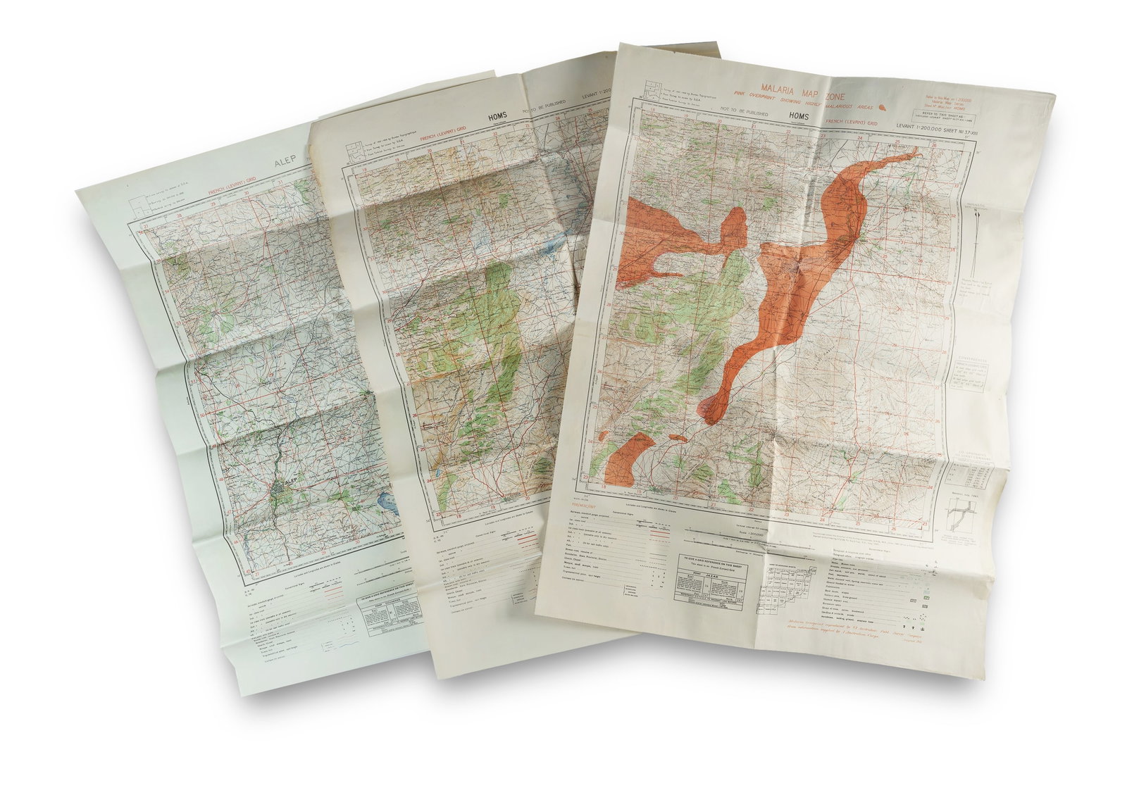 7 WWII Military Maps of the Levant: 7 WWII Military Maps of the Levant Including 4 cotton-backed 'Malaria Maps,' all at 1:200.000 scale.