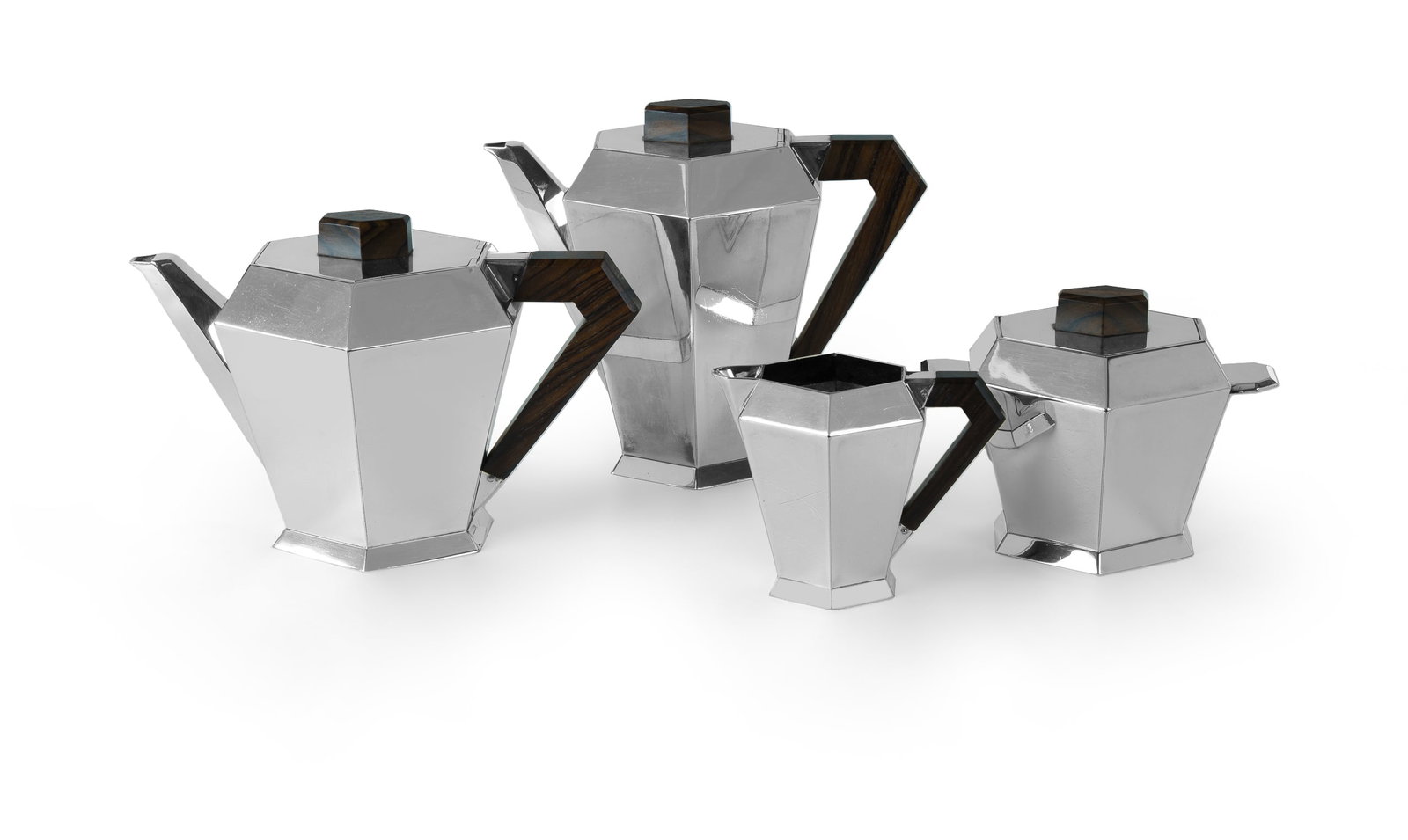 French Art Deco White Metal Tea Set: French Art Deco White Metal Tea Set Comprising 4 pieces, hexagonal in shape with Macassar ebony handles and knops. Stamped to base of each with chess piece, model number, and 'METALBLANC'. Likely by C