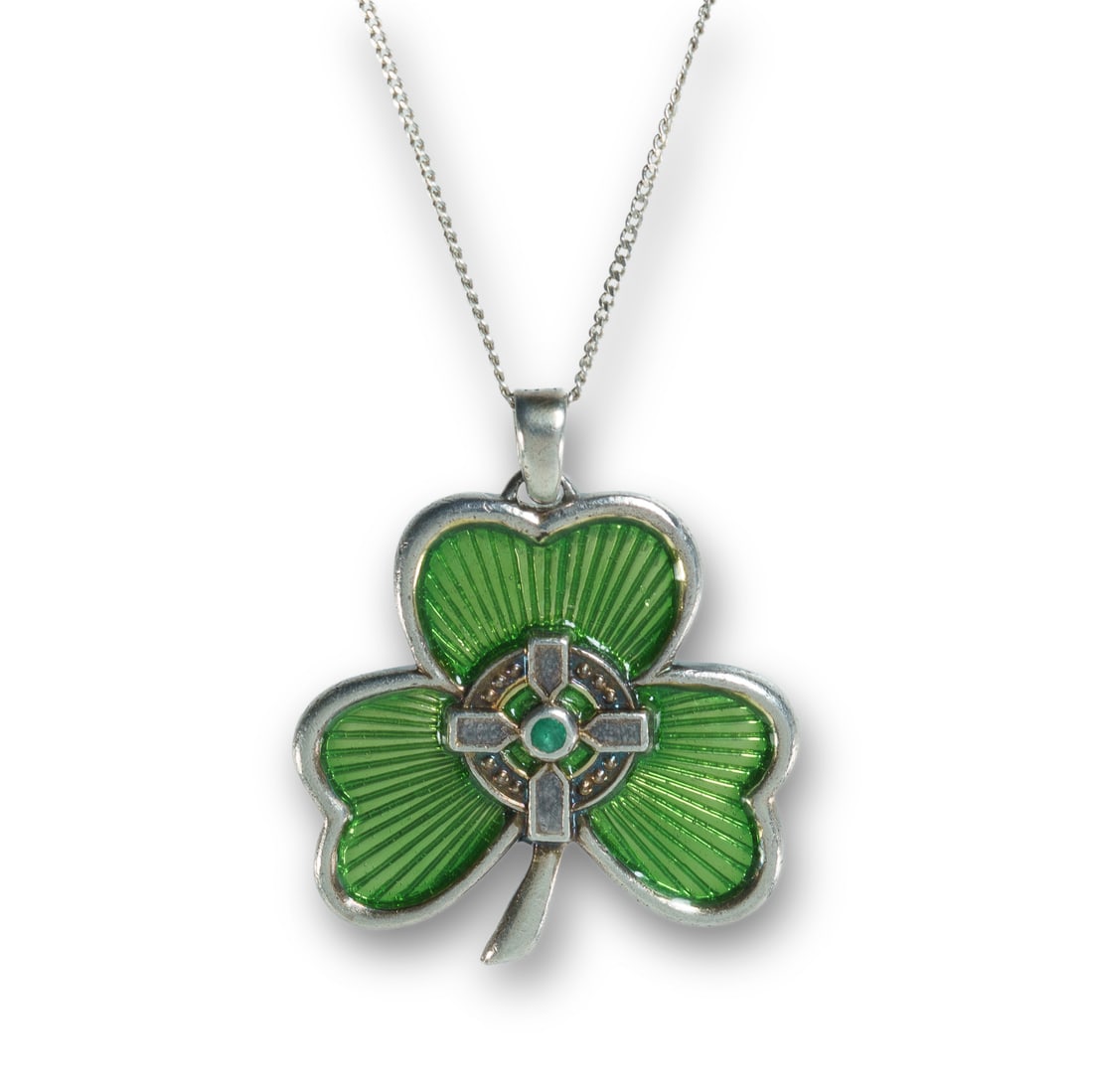 Silver Shamrock Pendant & Chain: Silver Shamrock Pendant & Chain Enamelled silver shamrock pendant set with emerald, on a fine silver chain. Reverse engraved with 'May the road rise up to meet you, may the wind be always at your back