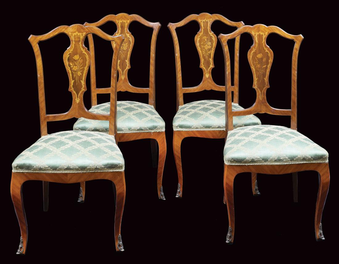 Four rosewood and mohagany chairs Italy, antique: finely inlaid in fruit woods with floral and vegetal patterns, seat covered in fabric