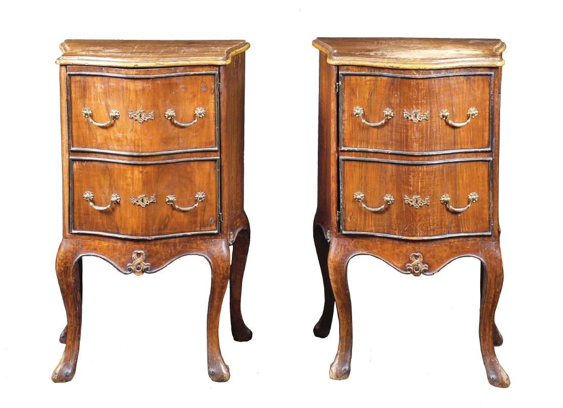 A pair of walnut night tables Italy, antique: shaped top, one door simulating drawers, bronze handles