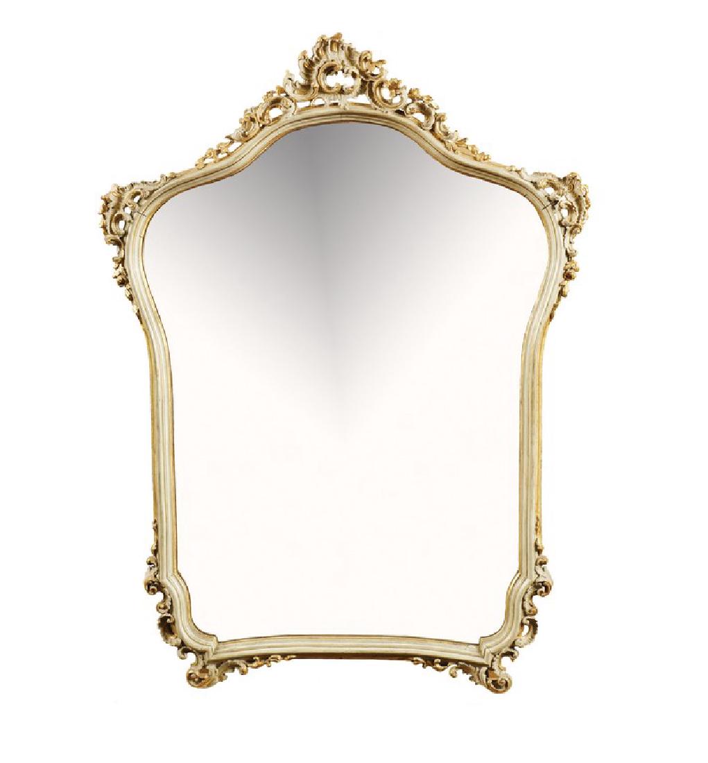 A lacquered and gitlwood mirror Italy, antique: shaped and inlaid frame