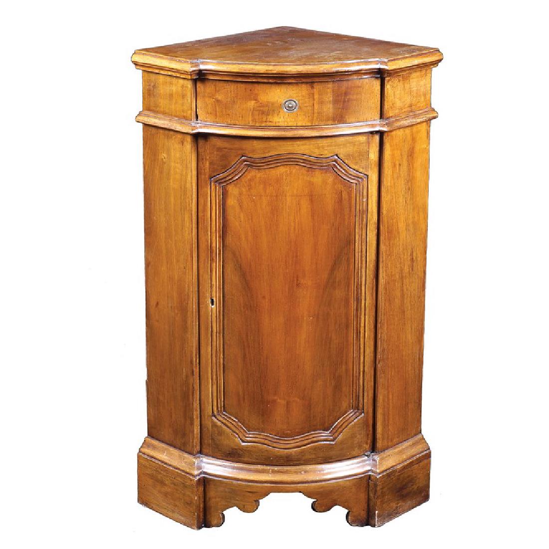 A walnut corner cabinet Italy, antique manufacture: shaped top, a drawer and a door