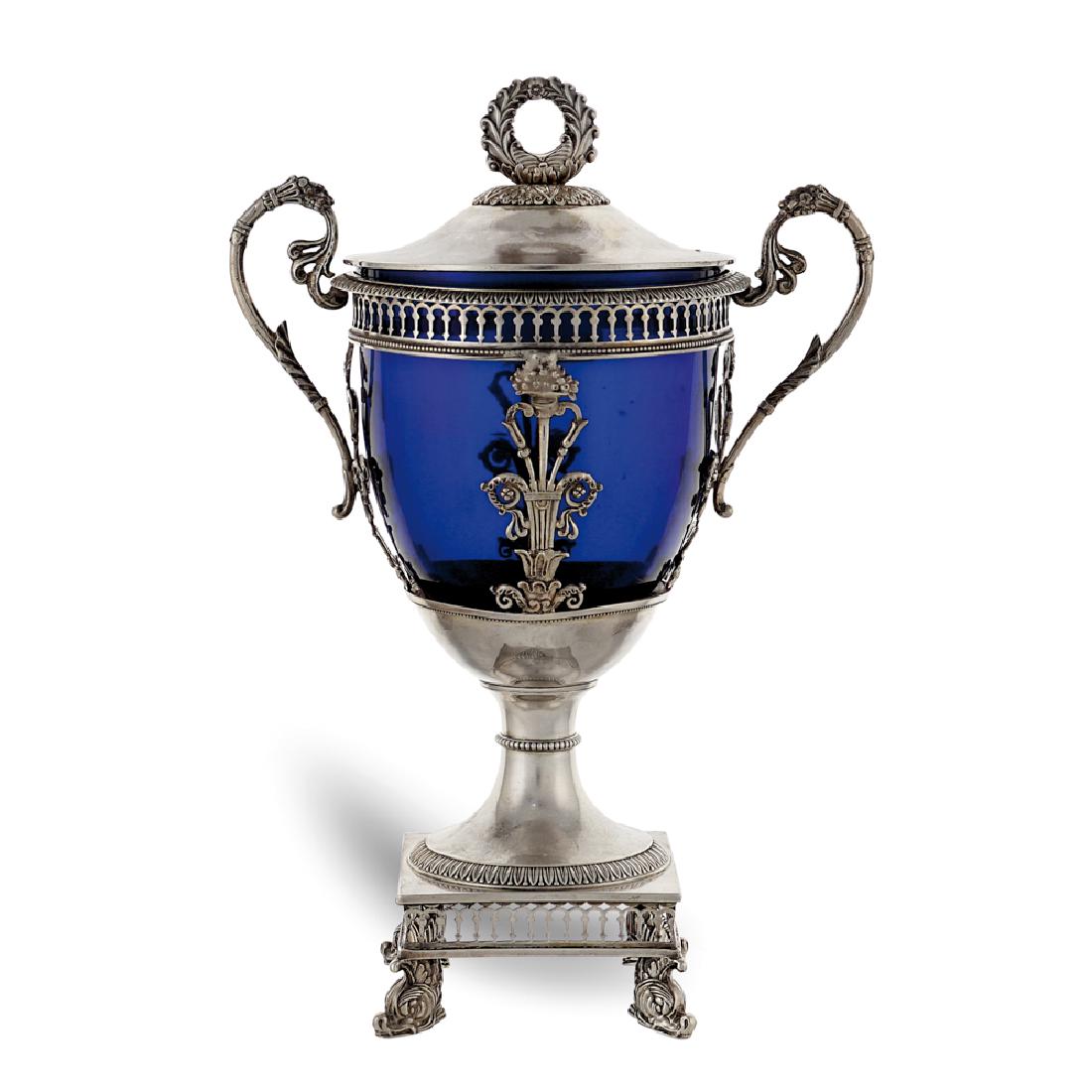Silver sugar bowl France, 1819 -1838 weight 360 gr.: G.J Bombard goldsmith, body inlaid and chiselled with impero patterns, vegetal scrolls handles, blue opal glass cup, h. 24 cm.