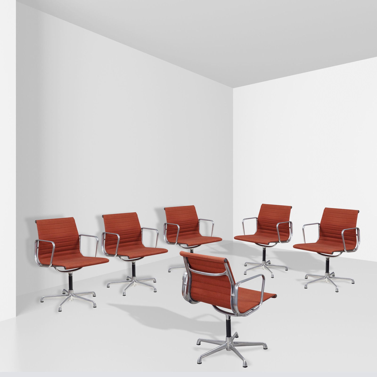 After Charles Eames, prod. ICF Casdana (6): Italia, 1970s 84x56x54 cm., six aluminum and fabric swivel chairs, production label