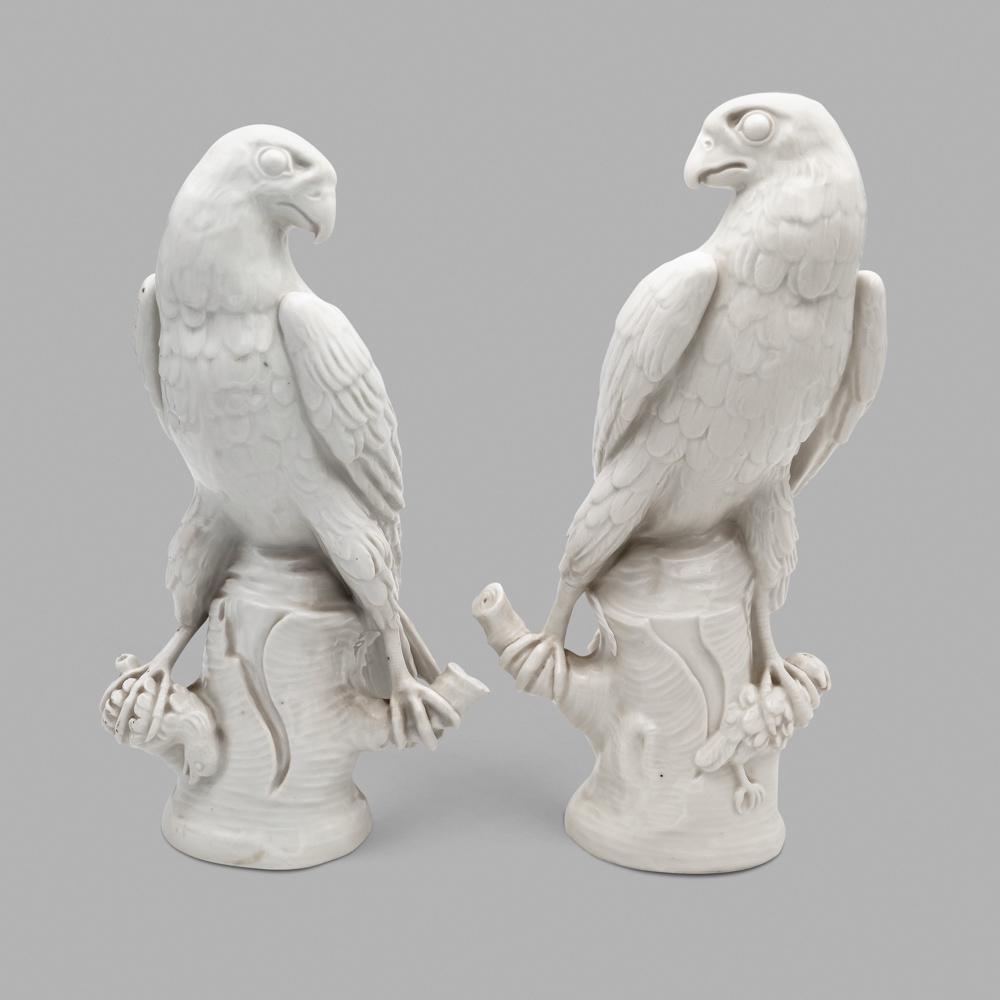 KPM (2): Berlin, 1950s, h. 23,5-25 cm., pair of white porcelain parrots, mark under the bases