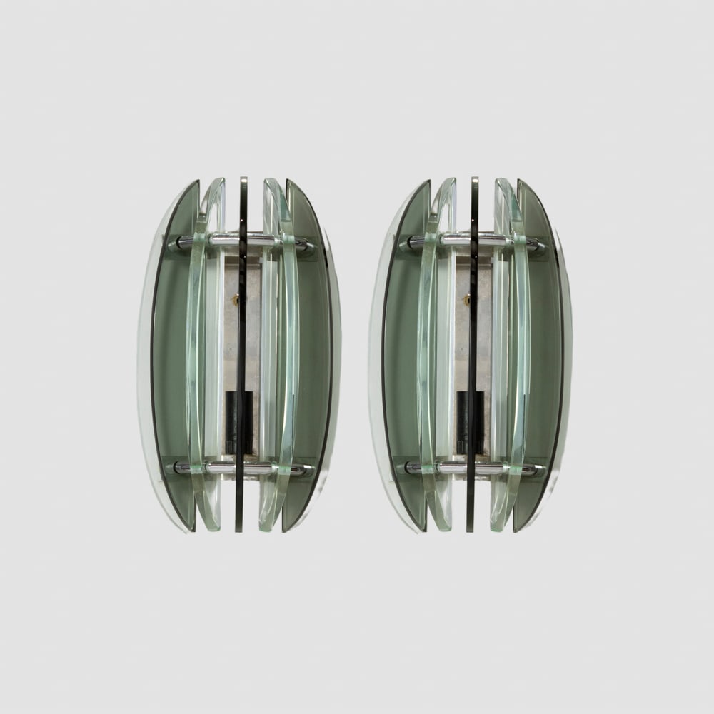 Prod. Veca (2): Italy, 1960s, 28x16 cm., Pair of wall lamps in chromed metal, clear glass and colored glass, production label