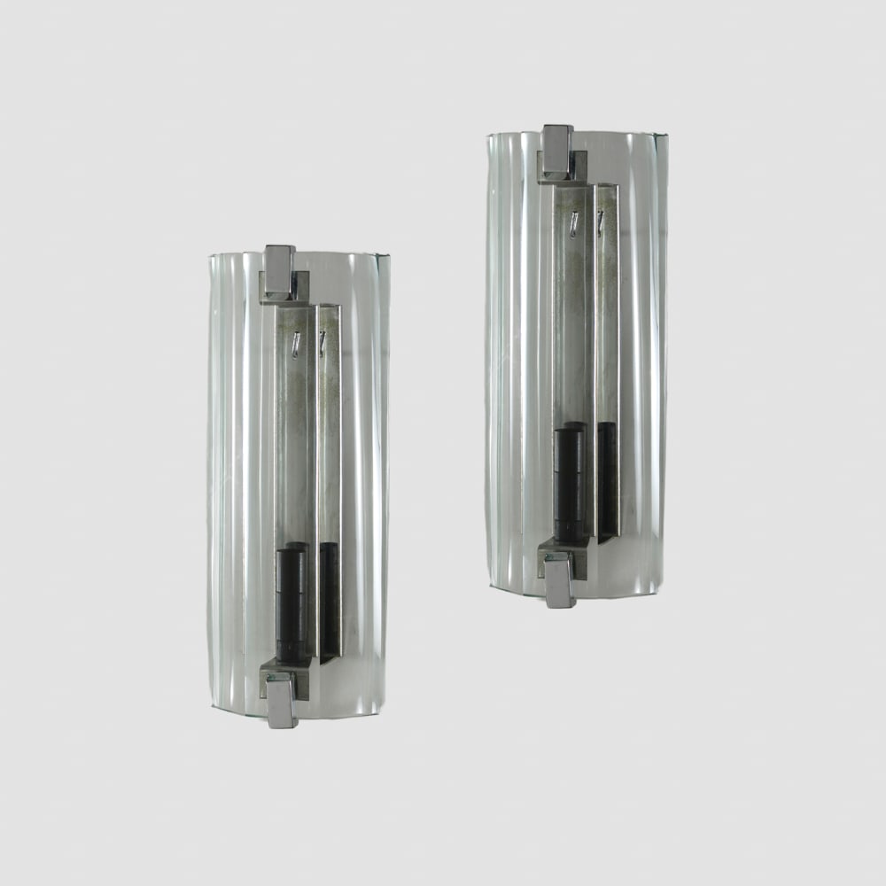 Veca prod. (2): 1970s, 27x11x7 cm., Pair of wall lamps in transparent glass and steel, production label
