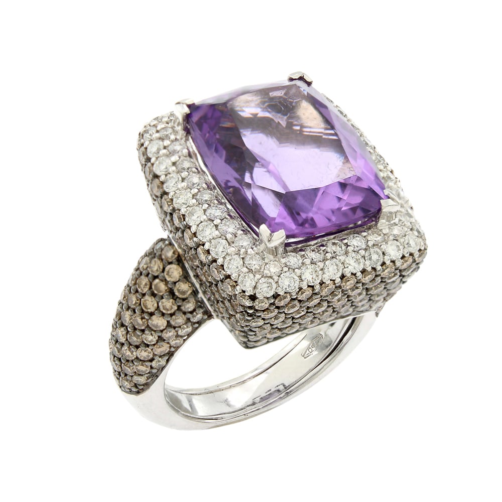 Crivelli 18kt white gold amethyst and diamonds ring: mark AL3130, weight 16 g., amethyst circa 8 ct, brilliant cut diamonds and brown diamonds circa 4 ct, size 12