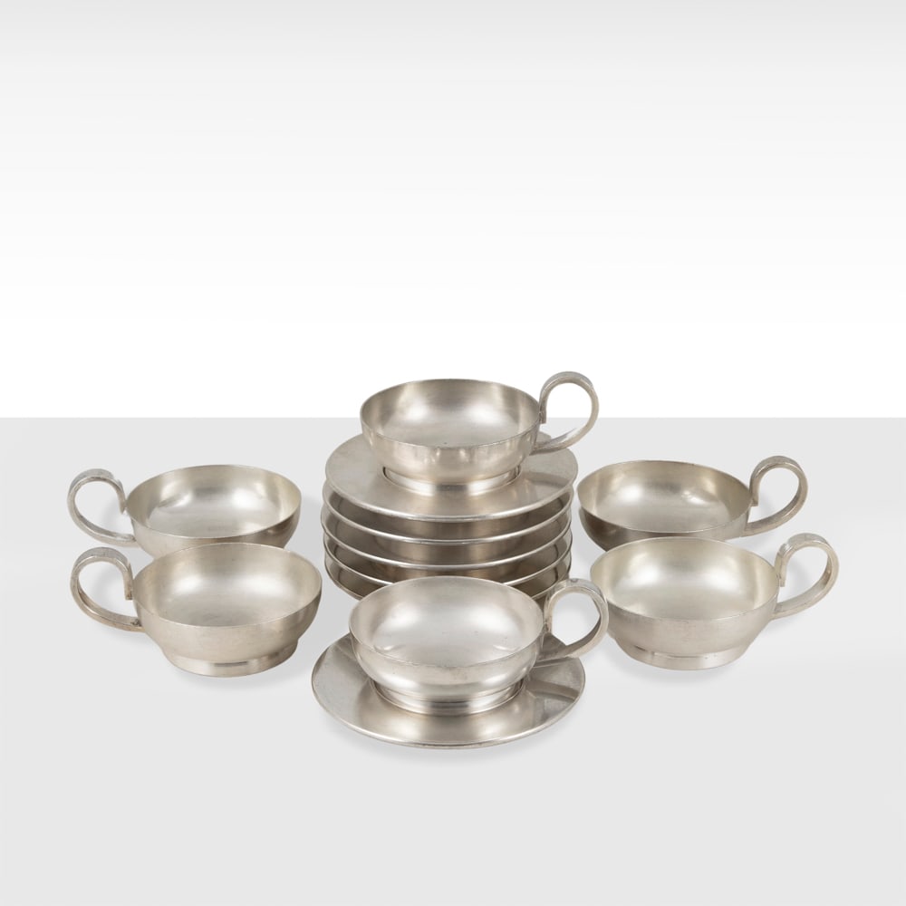 Gio Ponti, prod. Arthur Krupp (12): Italy, 1930/40s, 6x12.5cm., six coffee cups with silvered metal saucers, production mark