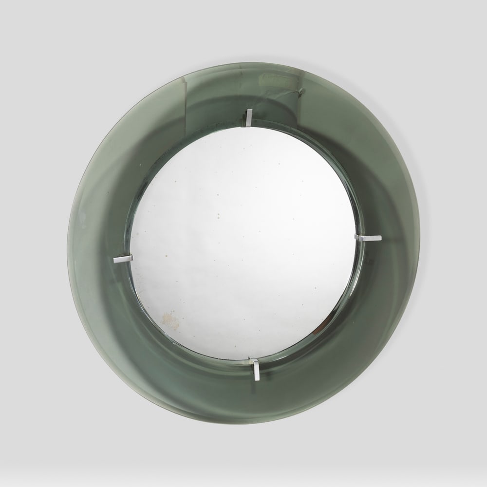 Prod. Veca, attributed: Italy, 1960s, d. 69 cm., wall mirror in colored glass, mirrored glass and chromed metal, slight wears