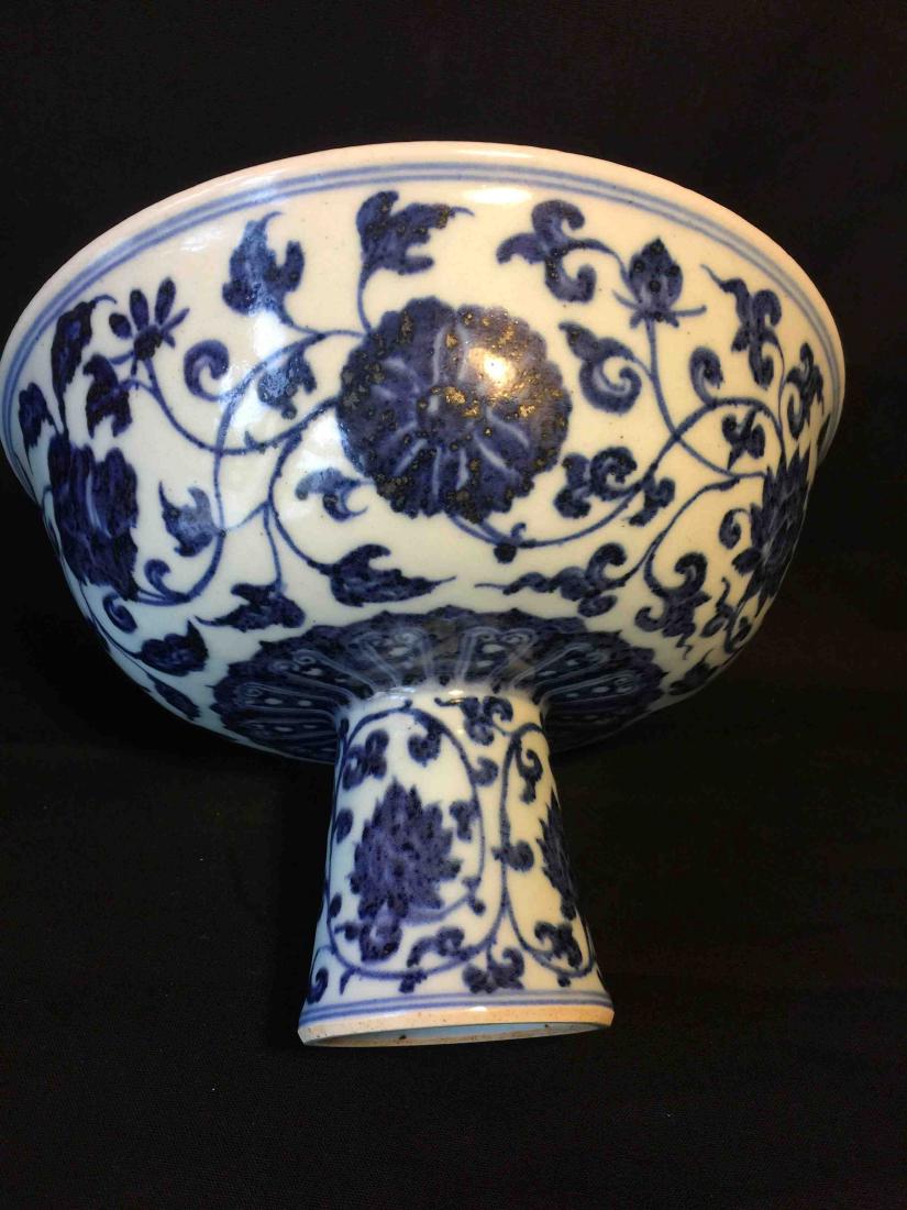 Blue and white high stem bowl: engraved with flora and fruit