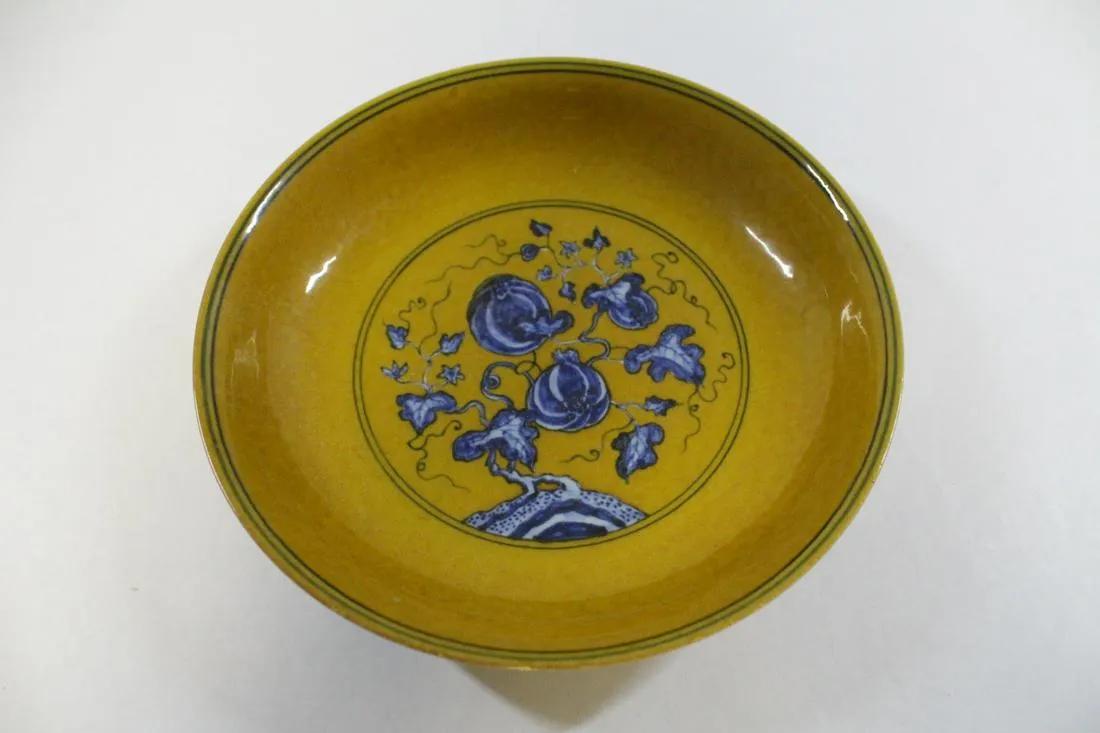 A fine Chinese blue on yellow porcelain plate (1 of 5)