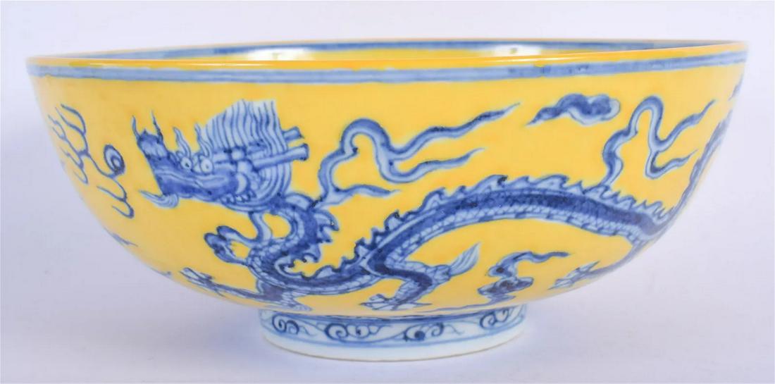 A CHINESE Ming Dynasty Xuande Year System style BLUE AND WHITE YELLOW GLAZED BOWL: A CHINESE Ming Dynasty Xuande Year System style BLUE AND WHITE YELLOW GLAZED BOWL 20th Century. 19 cm wide.