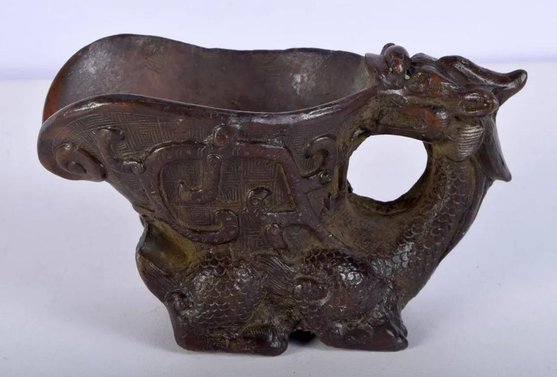 Chinese bronze libation cup in the form of a dragon (1 of 4)