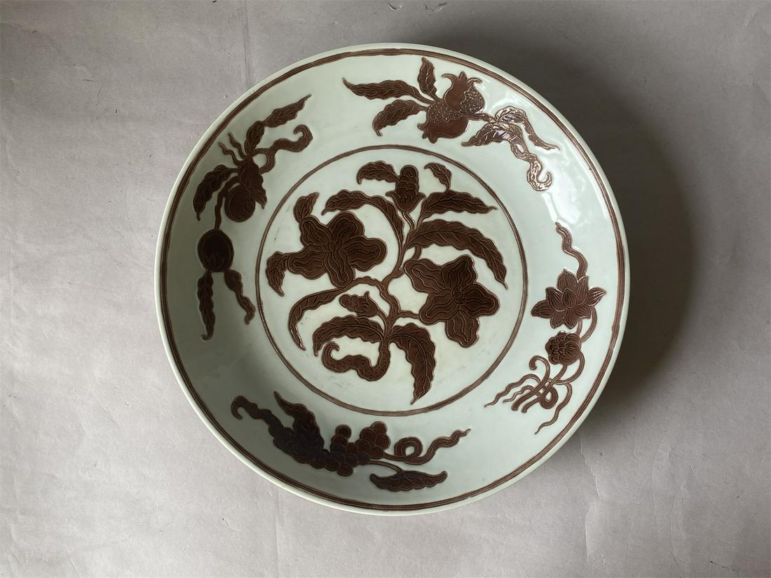Chinese Ming Dynasty Hongzhi style carved floral plate: D 27.5cmï¼ŒSource: Provided by a Los Angeles collector.
