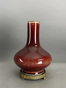Chinese Qing Dynasty Qianlong Mark red glazed porcelain vase on metal base