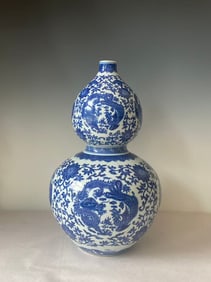 Chinese Qing Dynasty style Qianlong period blue and white porcelain vase with dragon and phoenix