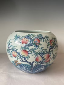 Chinese Qing Dynasty Qianlong period polychrome porcelain vase with paintings of longevity and