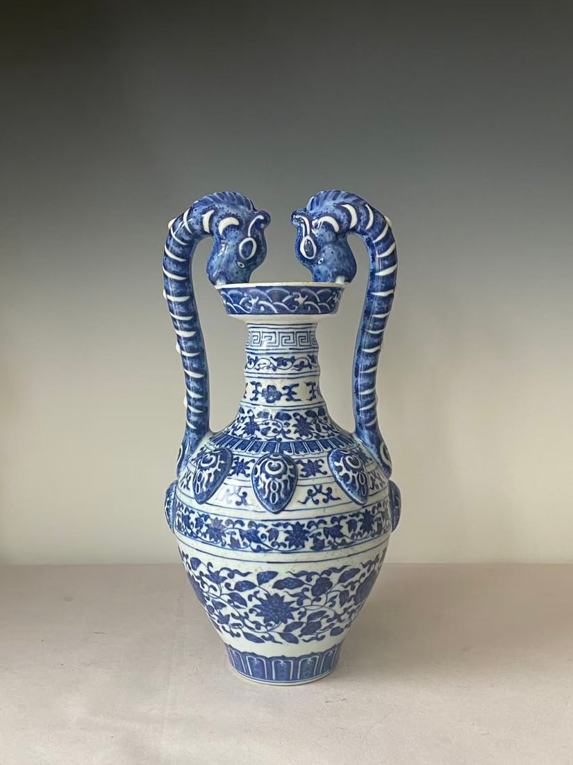 Chinese Qing Dynasty Yongzheng period blue and white porcelain vase with double animal-shaped ears: A Yongzheng blue and white porcelain vase with double animal-shaped ears,H:10.75 , W: 6.5inches