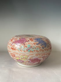 A Chinese Qing Dynasty Yongzheng multicolored porcelain treasure box with sea beast patterns
