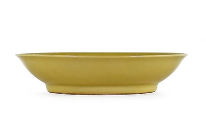 A Chinese Ming Dynasty Xuande period mark Yellow Glazed Footed Dish