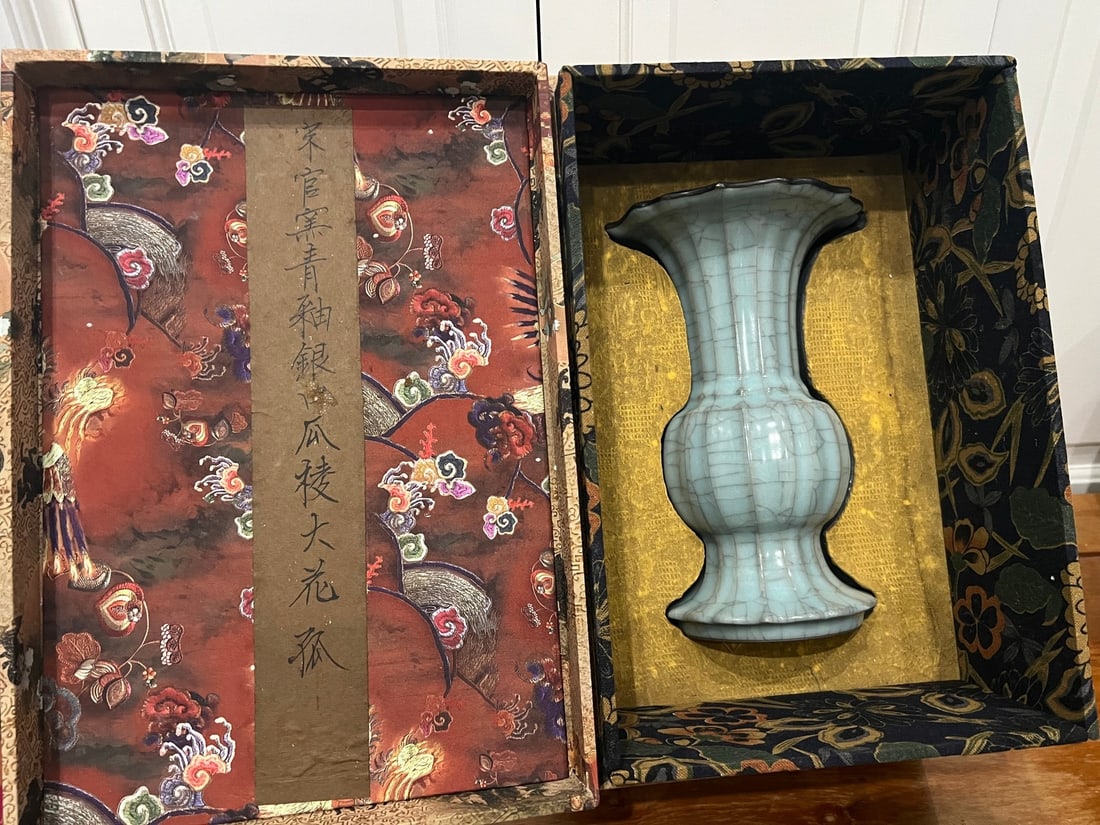 Chinese Ru-Type Celadon Crackle Glazed Mallet Vase, Song style: An elegant Chinese Ru-type celadon crackle-glazed mallet vase, beautifully modeled with a compressed globular lower body rising to a long trumpet neck and flared lobed rim. The vase is covered in a lu
