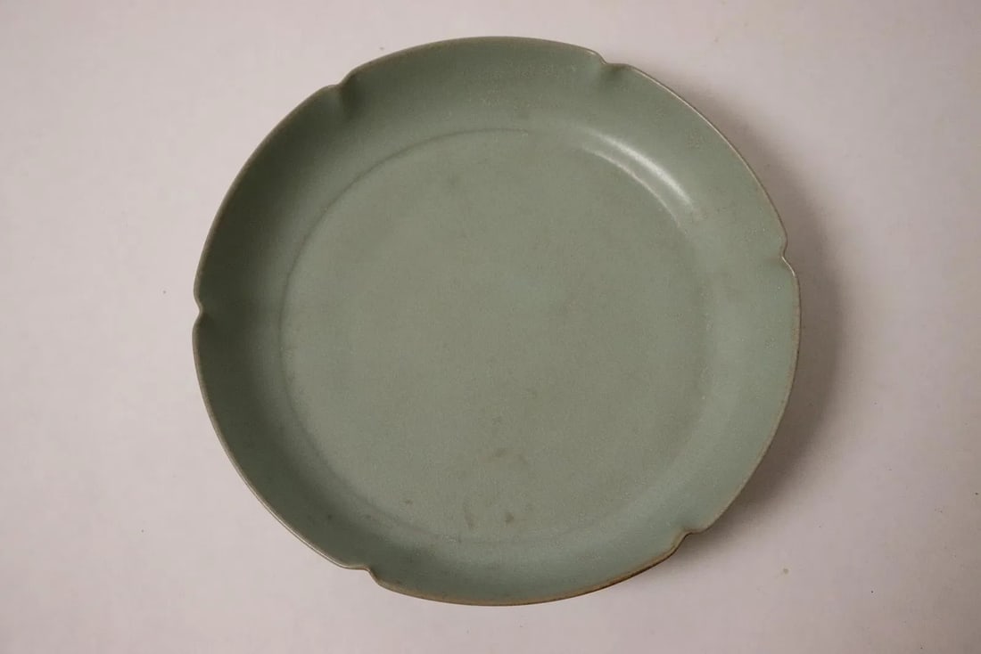 A fine Chinese Song style light celadon porcelain plate (1 of 4)