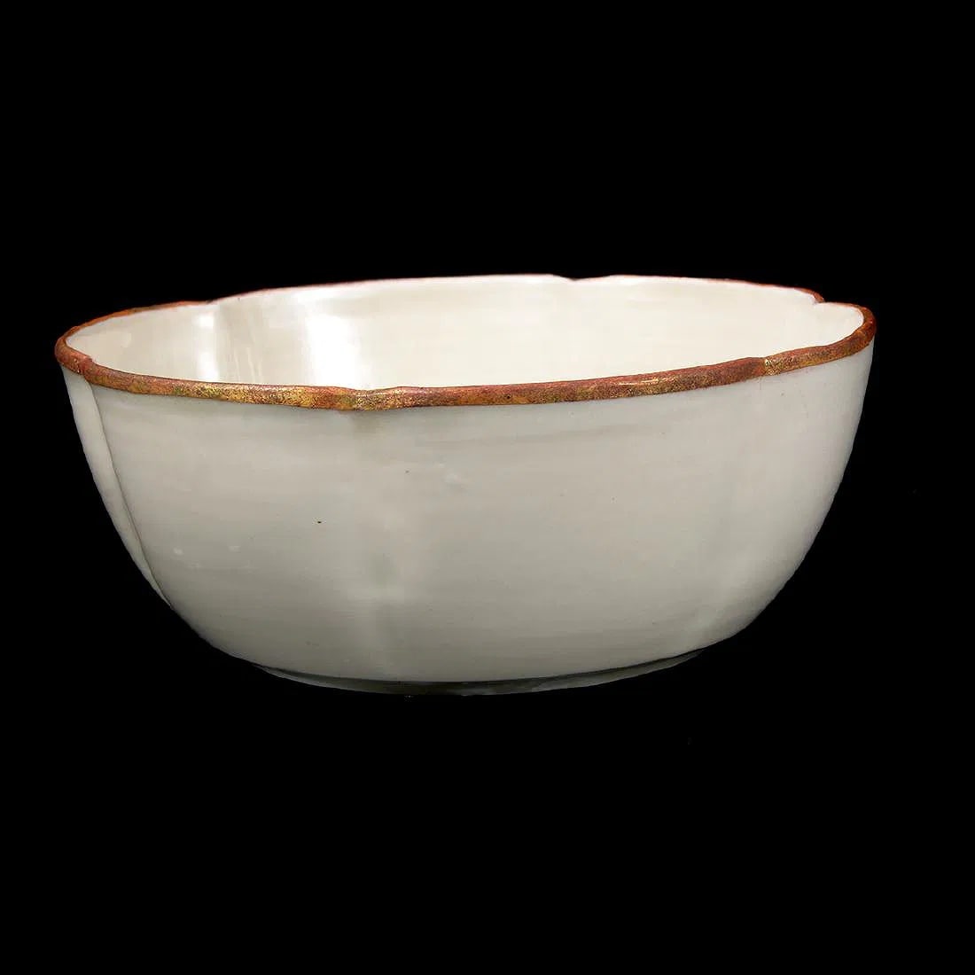 Chinese Dingyao Carved White Glazed Foliate Bowl. (1 of 4)